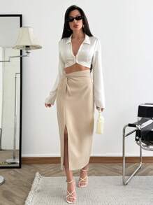 SHEIN Vrouwen effen kleur geweven voorkant asymmetrische knoop gedetailleerde midi lengte elegante kantoor zakelijke werk rok voorkant split dame onderkant