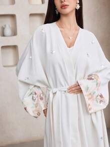 Al Najma Women's Sequin Embroidery Flare Sleeve Belted Abaya - White - View 2