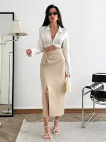 SHEIN Vrouwen effen kleur geweven voorkant asymmetrische knoop gedetailleerde midi lengte elegante kantoor zakelijke werk rok voorkant split dame onderkant