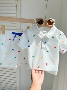 SHEIN Conjunto de 2 peças para bebê menino, camisa polo casual fofa com estampa de coroa e shorts com cós elástico, ideal para festas de aniversário, festas noturnas, apresentações, casamentos, chás de bebê, batizados e comemoração de 1º aniversário - Multicolorido - Ver 7