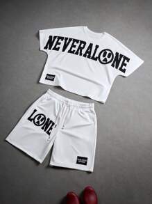 Manfinity EMRG Sommer Herren Jungs Sport Streetwear Set bestehend aus T-Shirt mit besticktem Buchstabenmotiv und Shorts