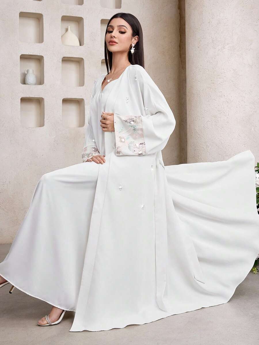 Al Najma Women's Sequin Embroidery Flare Sleeve Belted Abaya - White - View 1