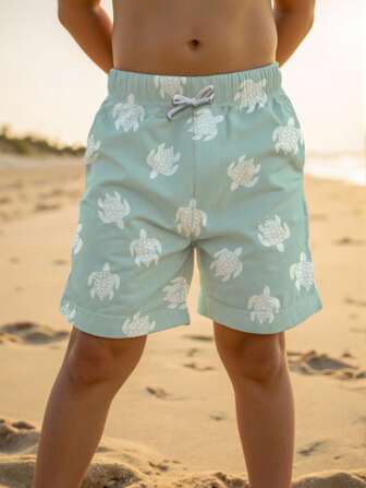 Short décontracté de plage ample pour préadolescents, imprimé de tortue de bande dessinée mignon et . Convient pour l'été, la plage, l'extérieur, la natation
