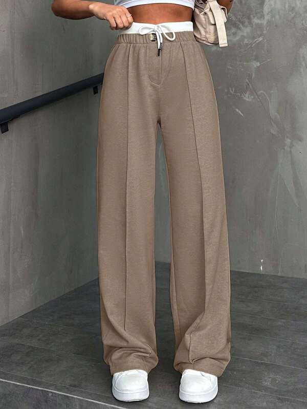 Pantaloni in cotone da donna con vita con cordoncino e bottoni frontali