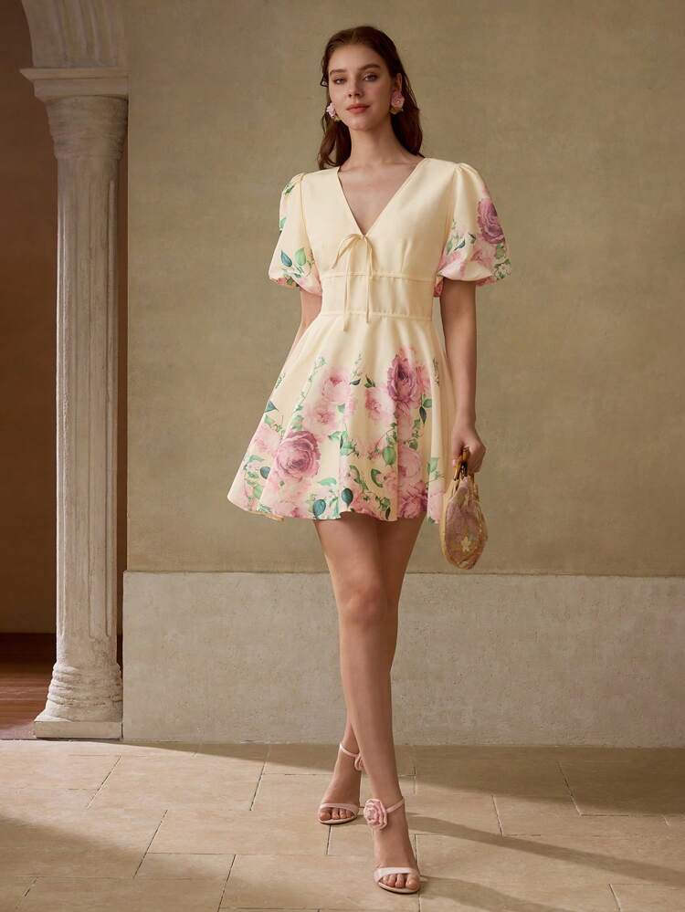 Abito elegante da donna con scollo a V, maniche a sbuffo e stampa floreale