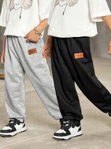 Set de 2 pantalones largos informales de unicolor de cintura elástica para niños pequeños