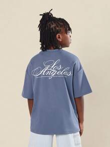 SUMWON Youth Los Angeles Script Oversized T-Shirt Streetwear Urban Summer Fashion Graphic Design Casual Comfort Classic West Coast Style - Blue - View 1