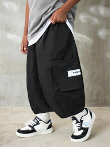 SHEIN Tween Boys Spring/Summer Dual Pocket Pants Straight Leg Drawstring Cargo Plain Black,Capri Pants, Modify Leg Shape, Tapered Cuffs - Black - View 2