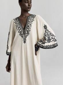 Ontre Nuevo vestido largo de verano para mujer 2026SS, unicolor, de moda, adecuado para el verano. Vestido largo suelto y cómodo de color avena con patrón bordado negro, estilo bohemio, manga acampanada, cuello en V, adecuado para fiestas, vacaciones, resort de isla, festivales de música, temporada de verano - Blanco - Ver 8