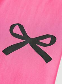 Conjunto de 2 peças de camiseta e shorts de ciclismo skinny com estampa de laço contrastante para meninas adolescentes, para a volta às aulas e cheio de estilo para meninas