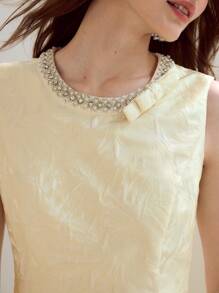 MOTF PREMIUM VÁY NGẮN KHÔNG TAY CÓ NƠ ĐÁ JACQUARD VÀ NGỌC TRAI GIẢ - Màu be - Xem 4