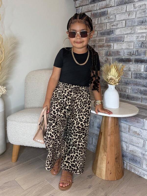 Set de 2 piezas para niñas jóvenes con camiseta de punto de cuello redondo negra y pantalones sueltos con estampado de leopardo, conjunto de moda cómodo y versátil