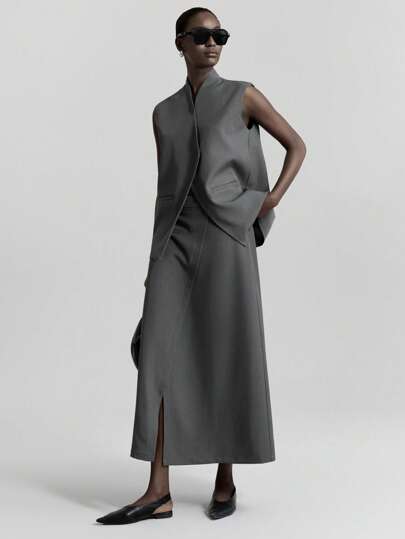 Ontre 2026 Spring/Summer New Urban Style Wrinkle-Resistant Fabric Dark Grey Suit Set, Blazer, Vest, Skirt, Business Casual Outfit, Loose Fit Set Modern Urban Casual Fashion Business Casual Women's Office Wear Low-Key Old Money Style Effortless Temperament High-End Urban Commuting High-Quality Airport Women's Wear High-End Material