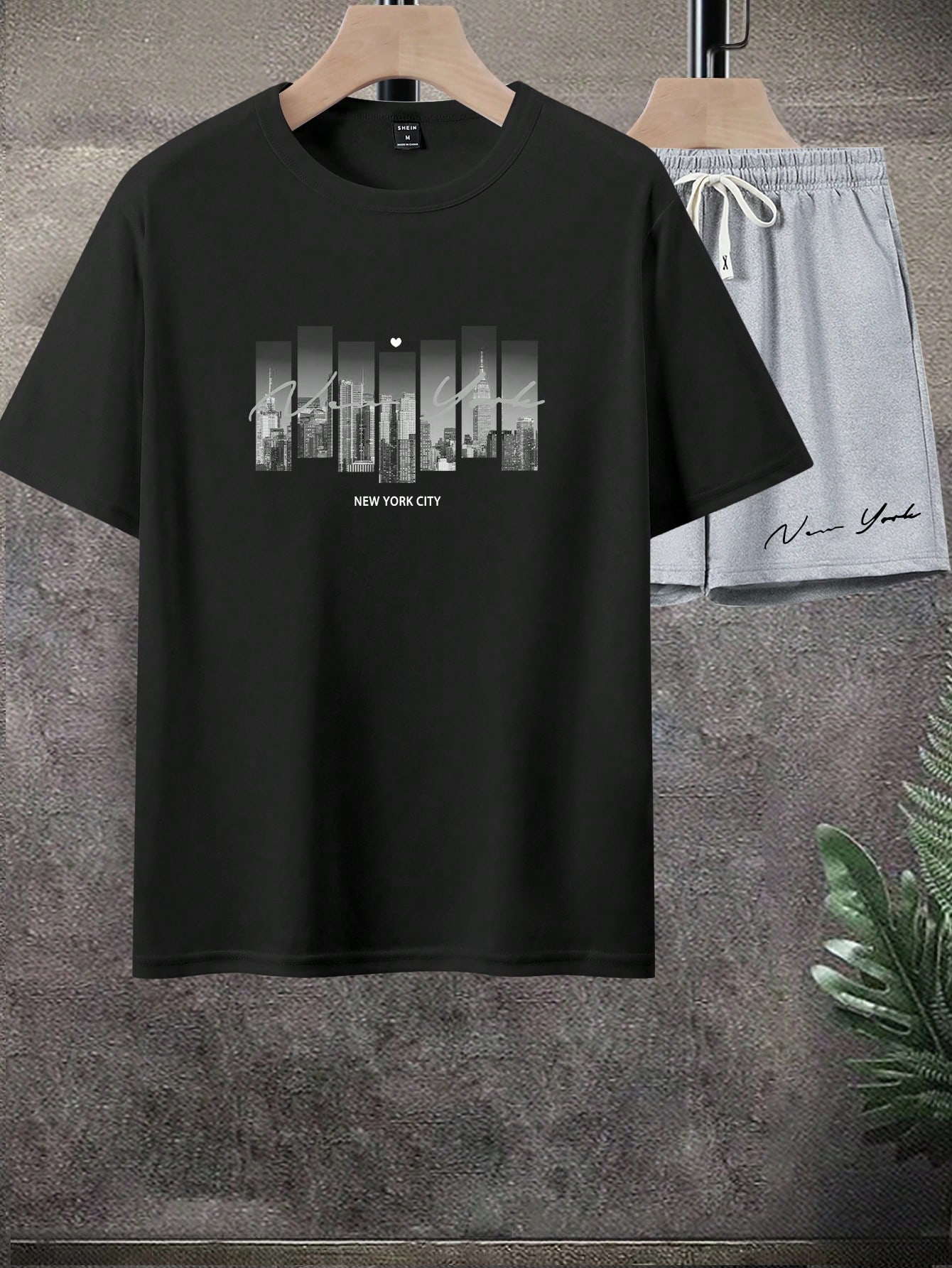 Manfinity Homme مجموعة تيشيرت كاجوال وشورت مطبوعة...