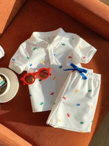 SHEIN Conjunto de 2 peças para bebê menino, camisa polo casual fofa com estampa de coroa e shorts com cós elástico, ideal para festas de aniversário, festas noturnas, apresentações, casamentos, chás de bebê, batizados e comemoração de 1º aniversário - Multicolorido - Ver 6
