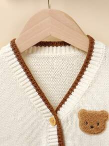 SHEIN Cream Embroidered Bear Design Open Front Long Sleeve Cardigan, Casual Minimalist Stylish Top For Toddlers Baby Boy Cardigan Baby Sweater Cardigan Baby Boy Sweater Baby Cardigan Sweater Baby Boy Knit Cardigan Baby Boys Long Sleeve Beige Knit Cardigan With Adorable Bear Patch And Collar Cute Beige Knitwear Baby Cardigan With Cartoon Patch And Collar For Boys Cute And Cozy Regular Fit Beige Knit Cardigan With Stylish Collar And Cartoon Accen Baby Boy Bear Cardigan Baby Boy Cardigan Fall Winter