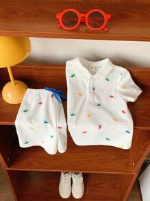 SHEIN Conjunto de 2 peças para bebê menino, camisa polo casual fofa com estampa de coroa e shorts com cós elástico, ideal para festas de aniversário, festas noturnas, apresentações, casamentos, chás de bebê, batizados e comemoração de 1º aniversário - Multicolorido - Ver 4