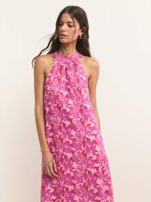 Nöista Sleeveless Halter-Neck Maxi Dress In Magenta With Soft Pink Floral Print. Lightweight, Breathable Chiffon Fabric. A-Line Silhouette With Flowing Drape. Feminine, Elegant, Romantic, Airy, Stylish, Comfortable, Summer-Ready, Versatile, Chic, Flattering. - Purple - View 1