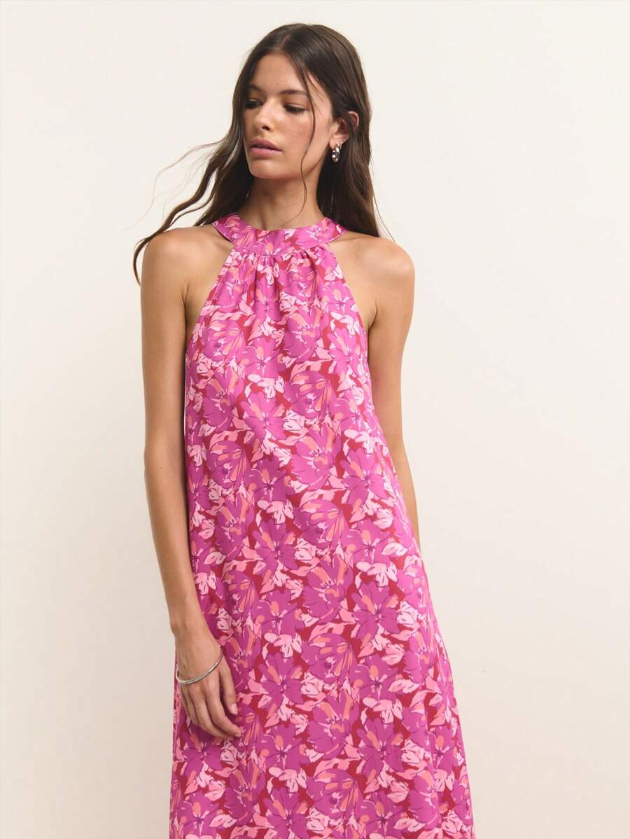 Nöista Sleeveless Halter-Neck Maxi Dress In Magenta With Soft Pink Floral Print. Lightweight, Breathable Chiffon Fabric. A-Line Silhouette With Flowing Drape. Feminine, Elegant, Romantic, Airy, Stylish, Comfortable, Summer-Ready, Versatile, Chic, Flattering. - Purple - View 1