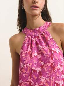 Nöista Sleeveless Halter-Neck Maxi Dress In Magenta With Soft Pink Floral Print. Lightweight, Breathable Chiffon Fabric. A-Line Silhouette With Flowing Drape. Feminine, Elegant, Romantic, Airy, Stylish, Comfortable, Summer-Ready, Versatile, Chic, Flattering. - Purple - View 4