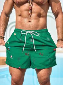 Manfinity Swimmode 男士图案印花口袋抽绳腰部沙滩短裤，适合夏季男士泳装男士沙滩装