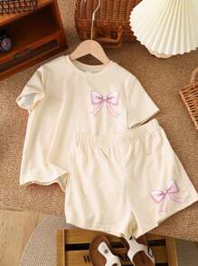 SHEIN Vintage Cute Bow Print, Pink Bow Design, Tween Girl Casual Minimalist Short Sleeve Shorts 2pcs Set, Suitable For Summer