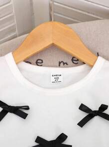 2pcs Girls Casual Comfortable Black Bow Decor Round Neck Short Sleeve T-Shirt & Milk Silk Flared Pants Set - Black and White - View 4