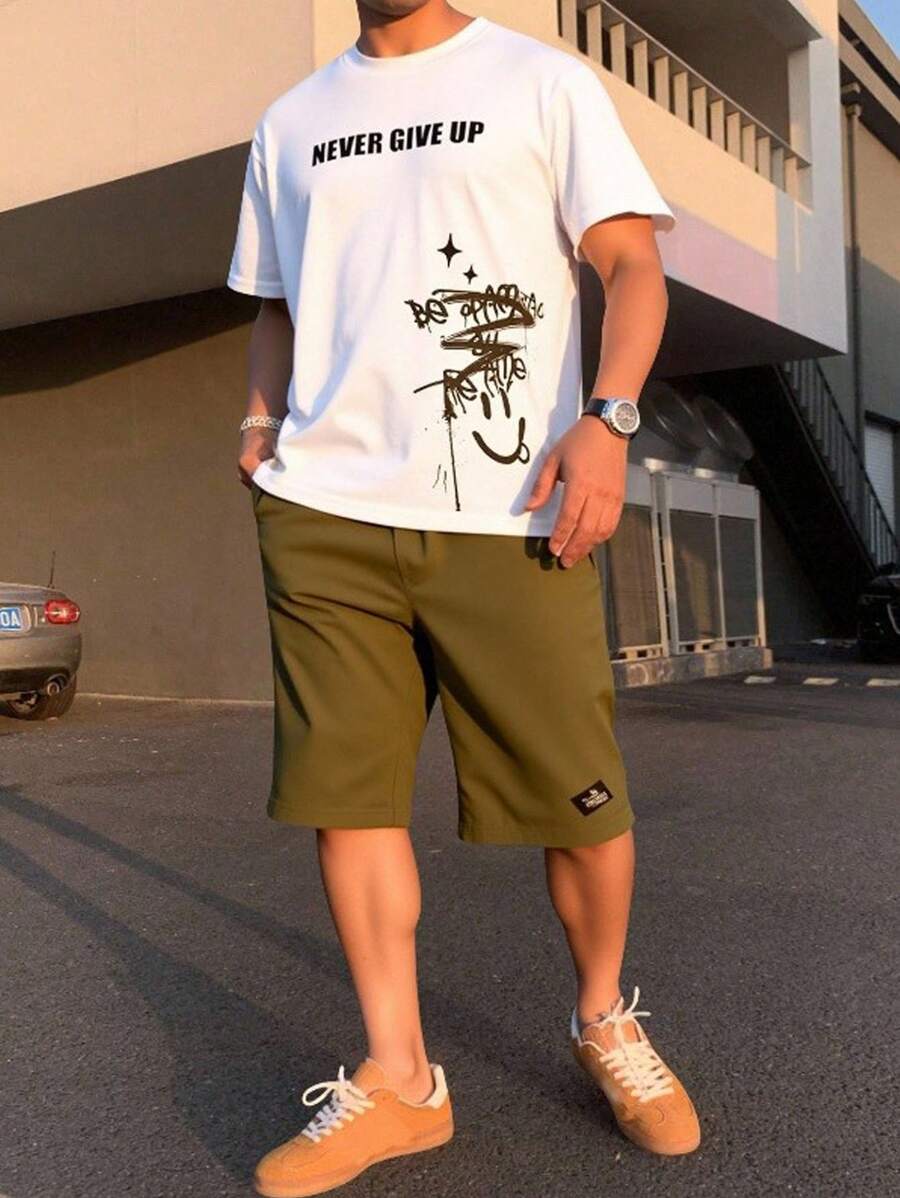 SHEIN 2 件套青少年男孩休闲短袖 T 恤和短裤套装，街头朋克摇滚风格，适合户外、派对、春夏季音乐节，男孩服装青少年服装带有英文涂鸦印花和颜色对比