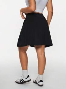 Mini-jupe de sport polyvalente et décontractée de couleur unie pour femmes en tailles plus
