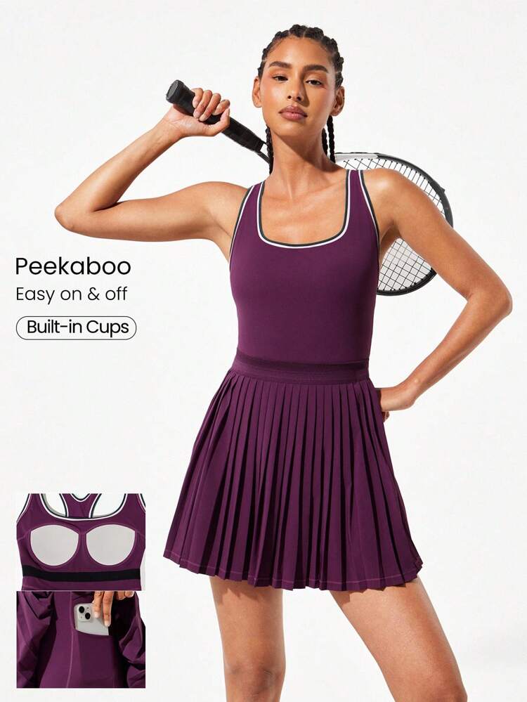Vestido con pantalón corto incorporado, bolsillos laterales, cintura elástica y pliegues de estilo 'peek-a-boo', hecho de tela FeatherFit™ de secado rápido y aire, ideal para tenis, entrenamiento, running de bajo impacto y gimnasio
