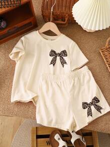 SHEIN 2pcs Vintage Bowknot & Leopard Print Tween Girls Casual Minimalist Short Sleeve Top And Shorts Set, Summer