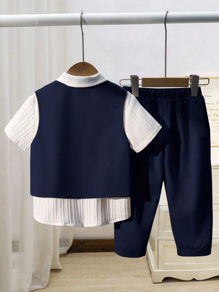 SHEIN بدلة طفل ولد بأسلوب جنتلمان متعددة الاستخدامات للصيف - جاكيت صدرية رمادية، مجموعة بنطلون طويل ذو خصر مطاطي، مناسبة لحفلة عيد الميلاد، حفلة المساء، الأداء، الزفاف، حفل استقبال المولود، المعمودية، احتفال عيد الميلاد الأول للطفل الولد. بدلة طفل ولد أزرق داكن مجموعة بدلة طفل ولد 18 شهر بدلة ولد أسلوب جنتلمان جاكيت طفل ولد أزرق داكن للخريف والشتاء - متعدد الألوان - مشاهدة 2