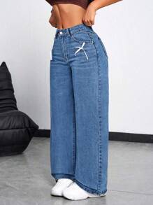 Jeanoix Luźne, rozkloszowane jeansy z kokardką - Średni jeans - Zobacz 5