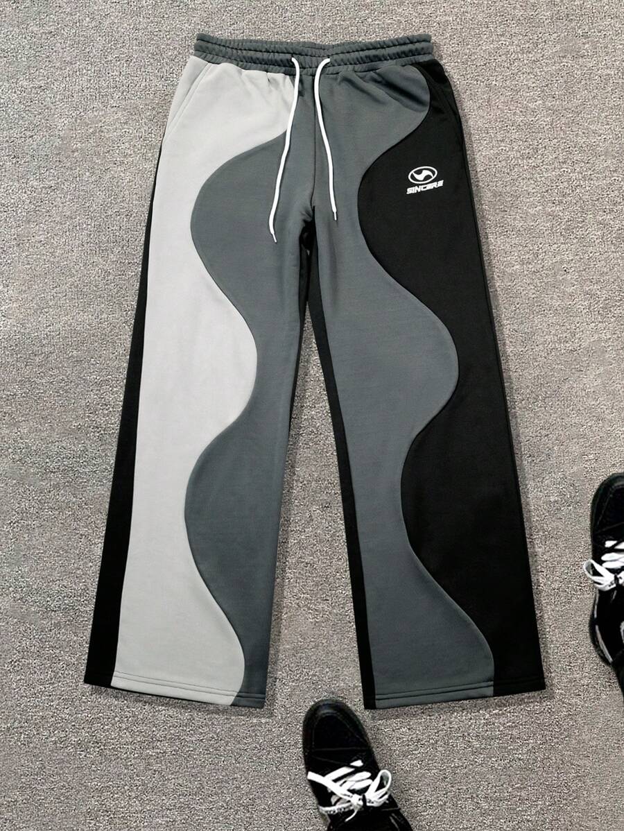 Manfinity LEGND Pantalones deportivos holgados con cintura con cordón y estampado de letras de color contrastante para hombre, para fiestas - Multicolor - Ver 1