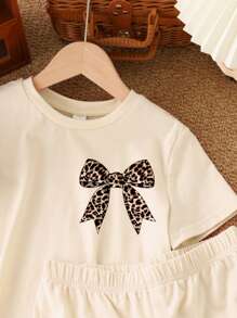 SHEIN 2pcs Vintage Bowknot & Leopard Print Tween Girls Casual Minimalist Short Sleeve Top And Shorts Set, Summer