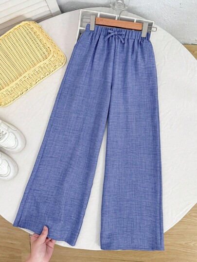SHEIN Pantalones azules sueltos y texturizados de uso informal para niñas preadolescentes, para la temporada de vuelta al colegio