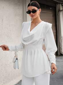 CLARA VERO Blusa con manga larga, cuello asimétrico, cintura recogida y puño largo