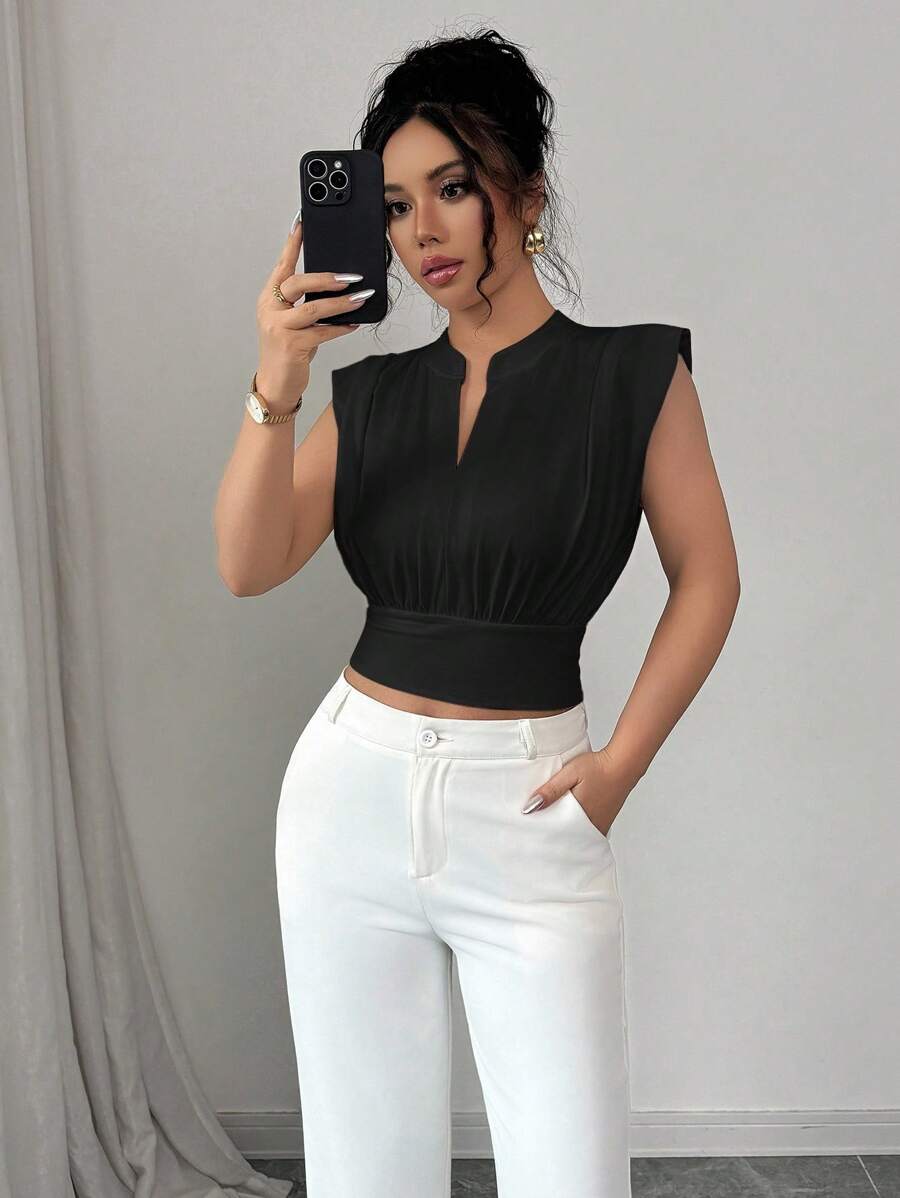 Elenzga Nueva camiseta sin mangas ajustada para mujer con cuello alto de punto, media cremallera frontal y estilo informal - Negro - Ver 1