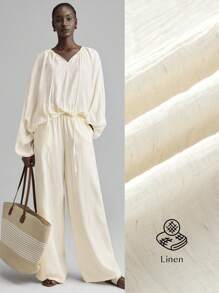 Ontre Áo thun nữ giáo viên thiết kế mới 2025 Ngày Độc lập, mặc thường ngày tại sân bay, chất liệu vải lanh thoải mái, cổ tròn, tay dài, thiết kế thắt nút, thắt eo, bo thun, dáng rộng, mặc hàng ngày, xuân/hè - Màu be - Xem 3