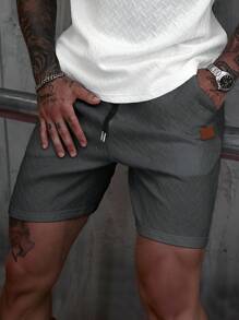 Manfinity CasualCool 男士夏季提花纹理抽绳短裤，罗纹领口和皮革贴片，送给男朋友或丈夫的贴心礼物 男士短裤 灰色短裤 设计师短裤 男士 男士街头潮流短裤 纹理短裤 男士