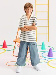 SHEIN Pantalones sólidos cómodos de cintura media con cordón para niño preadolescente