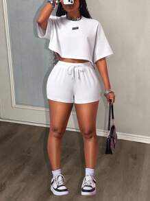 Slaydiva Bộ đồ thể thao mùa hè mới, phong cách đường phố, retro, kiểu dáng sinh viên, gồm áo thun cổ tròn tay ngắn và quần short siêu ngắn màu trắng, kiểu dáng rộng rãi, cỡ lớn, thoải mái, bộ đồ hai mảnh cho nữ. - trắng - Xem 4