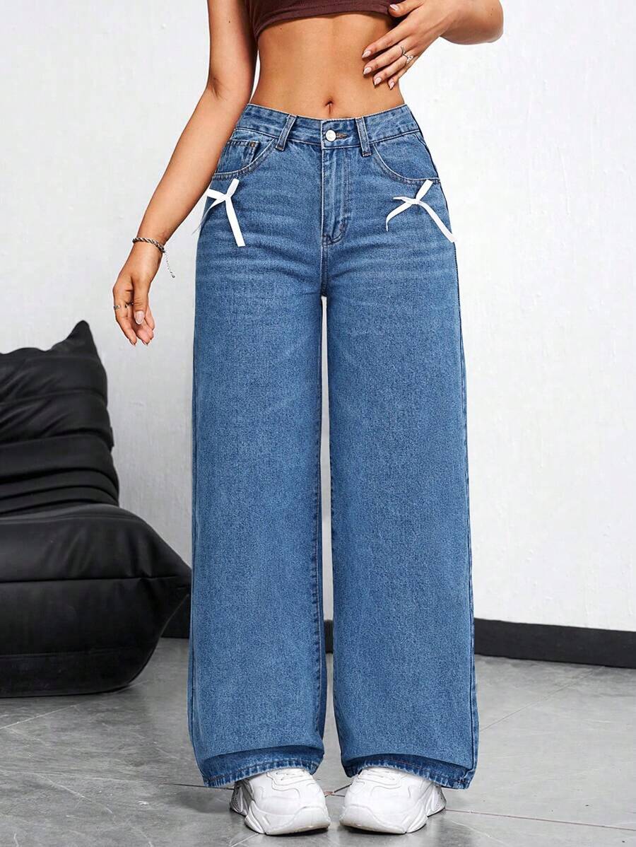 Jeanoix Luźne, rozkloszowane jeansy z kokardką - Średni jeans - Zobacz 1