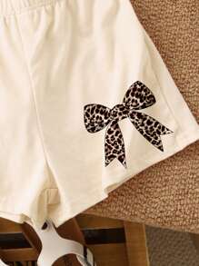 SHEIN 2pcs Vintage Bowknot & Leopard Print Tween Girls Casual Minimalist Short Sleeve Top And Shorts Set, Summer