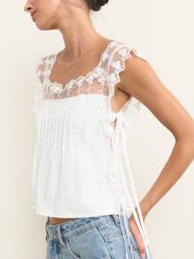 Nöista Romantyczny koronkowy top z falbankami na rękawach z siateczki w kwiaty. Lekka mieszanka bawełny, idealna na letnie stylizacje, na Święto Świętego Jana lub na co dzień na 4 lipca. Idealny wybór na urocze letnie bluzki.