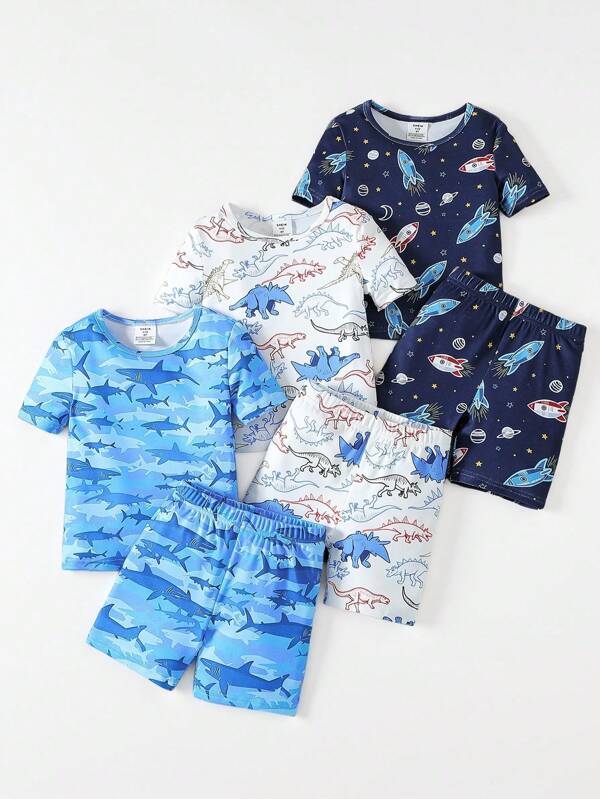 6-Piece Baby Boy Snug Fit Pajama Set, Including Short Sleeve Shirt And Shorts. Featuring Ocean Sharks, Dinosaurs, And Rocket Planet Designs. The Sleepwear Is Made Of Soft, Stretchy Fabric For Comfort, With A Bright And Cheerful Overall Scene Suitable For Children. Back To School Fashion