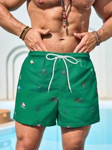 Manfinity Swimmode 男士图案印花口袋抽绳腰部沙滩短裤，适合夏季男士泳装男士沙滩装