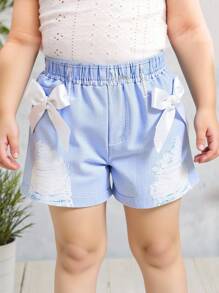 Pantalones cortos con lazo de impresión digital imitación de mezclilla para niñas pequeñas. Los nuevos productos para primavera, otoño y verano ya están en el mercado. Son cómodos, elegantes, lindos y sencillos, y son imprescindibles para el uso diario