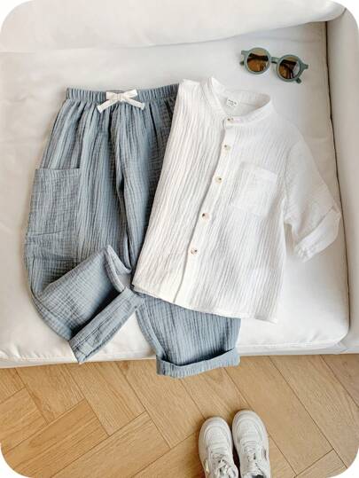SHEIN 2pcs/Set Young Boys Casual Sports Vacation Clean Color White Polo Shirt & Elastic Waist Pocket Solid Color Pants, Suitable For Kids Outfits, Young Boy Clothes, Back To School, Boys Set For Birthday Parties, Evening Parties, Performances, Weddings, Valentine's Day, Suitable For Daily Use, School, Travel, Sports, Spring And Summer Seasons