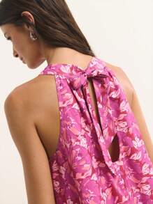 Nöista Sleeveless Halter-Neck Maxi Dress In Magenta With Soft Pink Floral Print. Lightweight, Breathable Chiffon Fabric. A-Line Silhouette With Flowing Drape. Feminine, Elegant, Romantic, Airy, Stylish, Comfortable, Summer-Ready, Versatile, Chic, Flattering. - Purple - View 5
